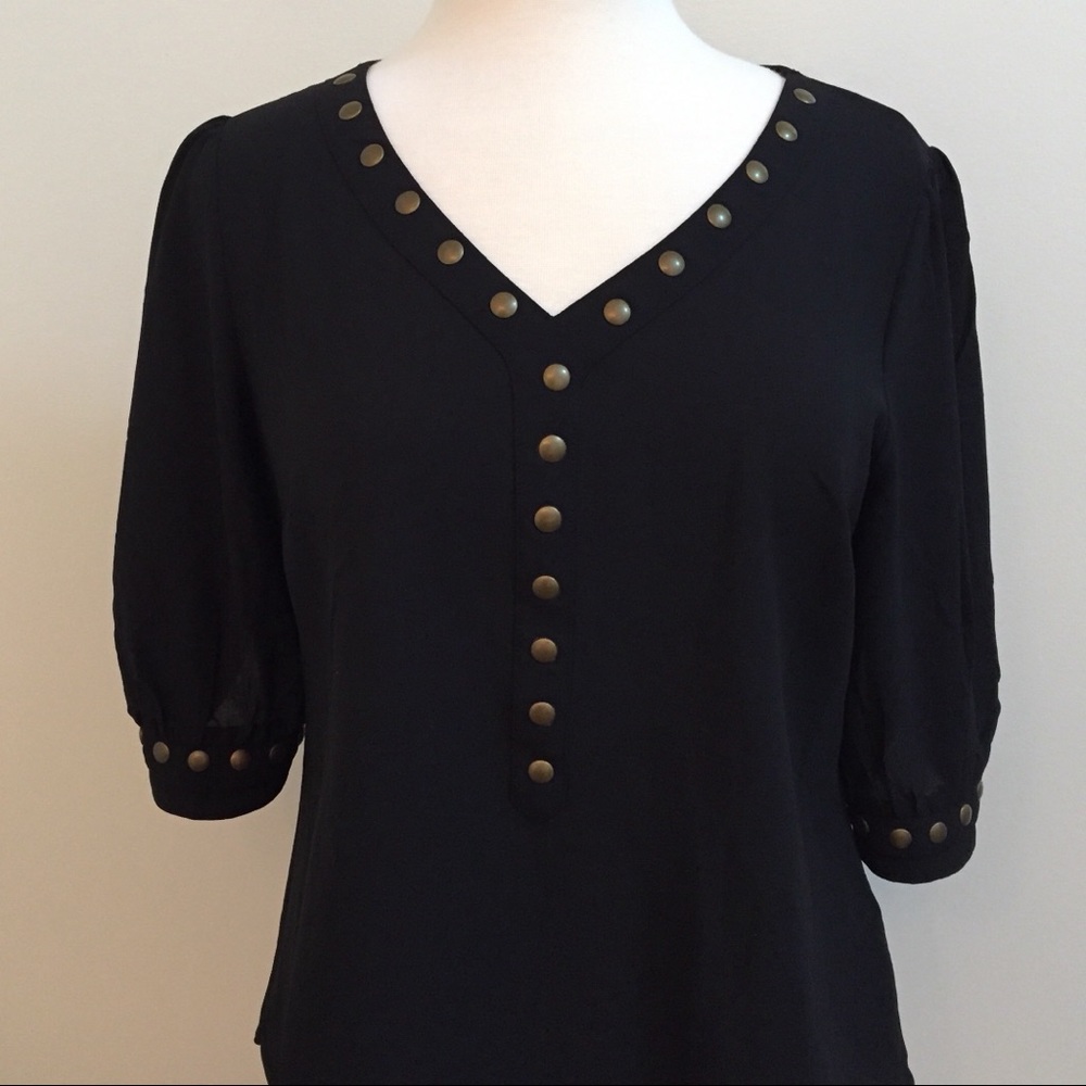 Black and brass shirt